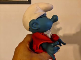 Grande Puffo in plastica con occhiali