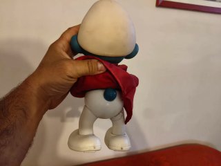 Grande Puffo in plastica con occhiali