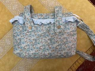 Bolso y colchoneta universal para silla de paseo