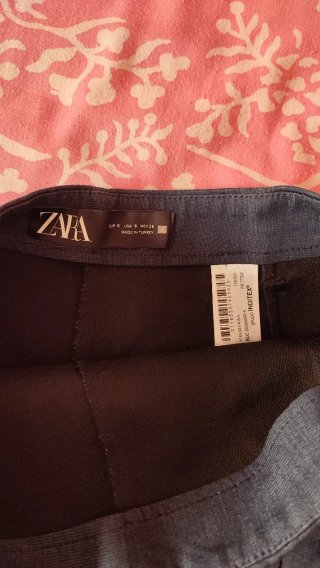 Falda short efecto jean azul con cinturón