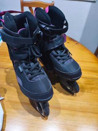 Patines en línea negros y fucsia talla 39.