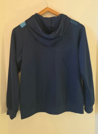 Chaqueta deportiva Joma azul y turquesa