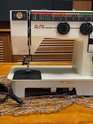 Máquina de coser Alfa electrónica
