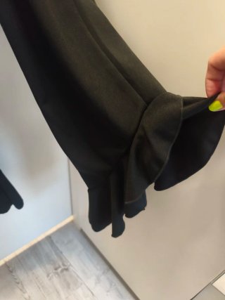 Conjunto negro con volantes