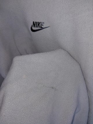 Maglia Nike Azzurra Felpata(macchia removibile)