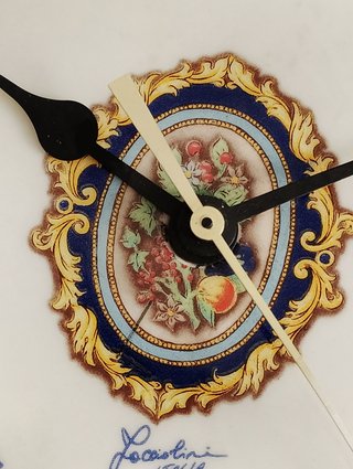 Orologio da parete decorato