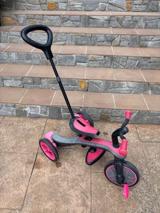 Triciclo infantil rosa y gris