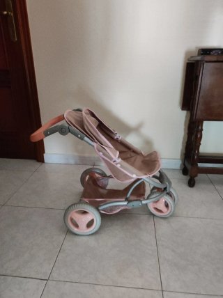 Carrito de muñecas rosa y beige