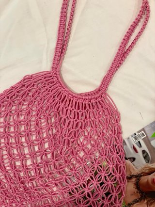 Bolso de red rosa tejido