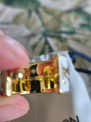 Pendientes Louis Vuitton dorados y blancos