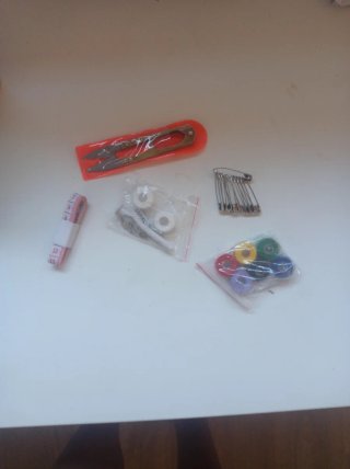 Máquina de coser de mano Handy Stitch