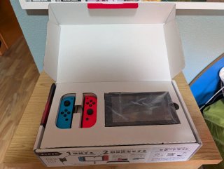 Nintendo Switch con mandos extra, caja y micro SD