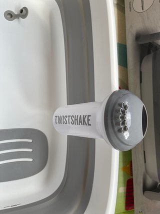Bañera bebé plegable con colchon , vaso y caja .