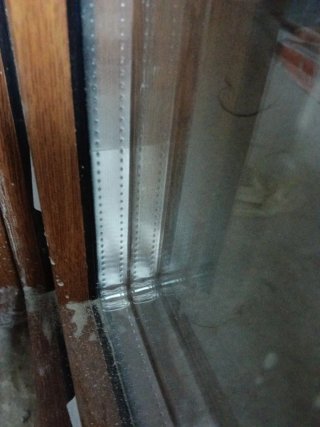 Ventana PVC imitación madera con persiana enrollab