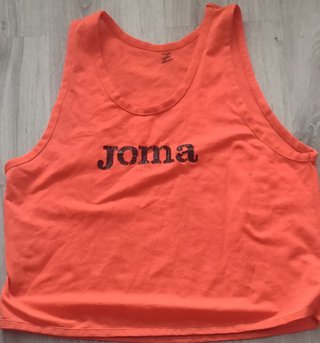 Petos deportivos Joma naranjas y rojo