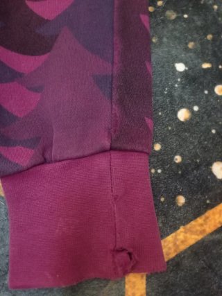 Sudadera Nike con estampado de árboles