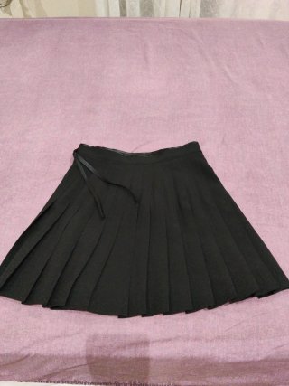 Minifalda negra de tablas Mango
