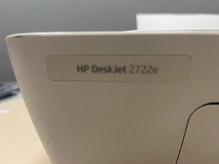 Impresora HP verde y blanca