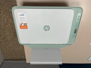 Impresora HP verde y blanca