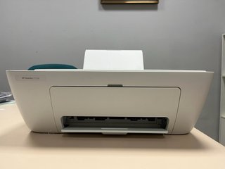 Impresora HP verde y blanca