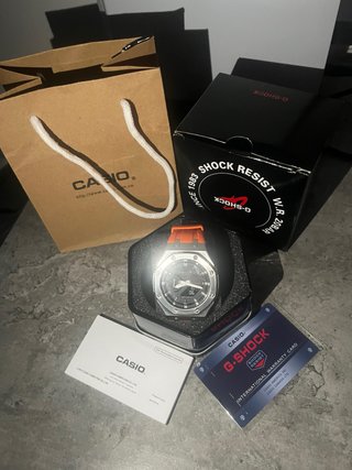 G-Shockx AP GM 2100-1A Naranja Plata