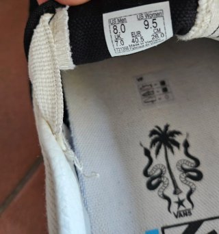 Zapatillas Vans Slip-On Negras y Blancas
