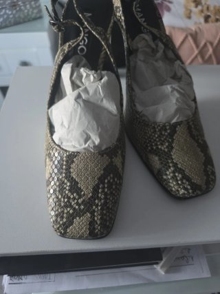 Zapatos Mango animal print destalonados