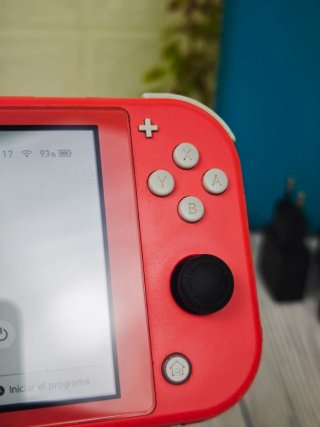Nintendo Switch Lite Coral + Mando + Funda