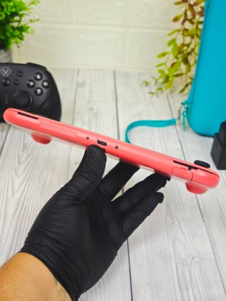 Nintendo Switch Lite Coral + Mando + Funda