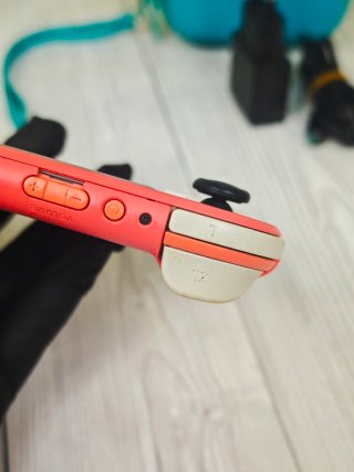 Nintendo Switch Lite Coral + Mando + Funda