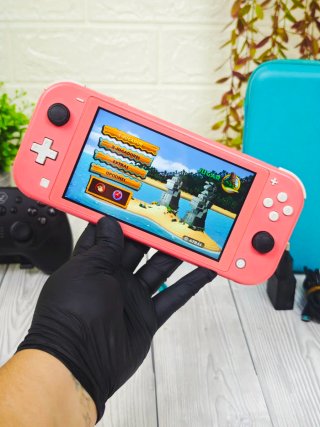Nintendo Switch Lite Coral + Mando + Funda