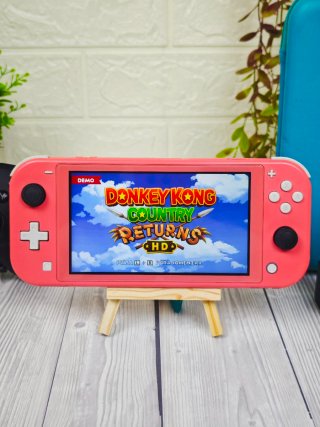 Nintendo Switch Lite Coral + Mando + Funda