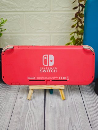 Nintendo Switch Lite Coral + Mando + Funda