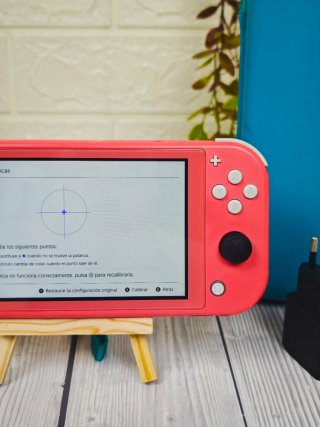 Nintendo Switch Lite Coral + Mando + Funda