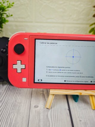 Nintendo Switch Lite Coral + Mando + Funda
