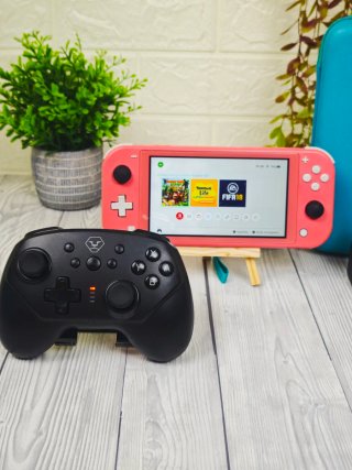 Nintendo Switch Lite Coral + Mando + Funda