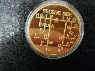 Moneda de Alfabeto Receive Side