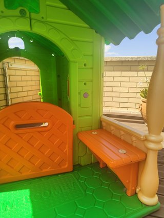 Casa infantil resina jardín