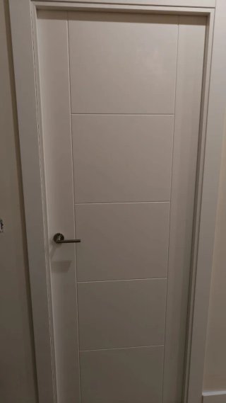 Puerta nueva 2x63,5 con manillar