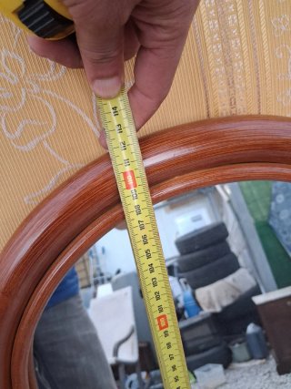 Espejo de madera con marco arqueado