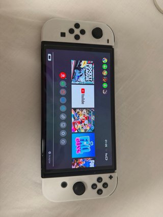 Nintendo Switch oled con todo , un mando y funda