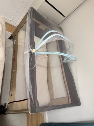 Cuna de viaje con mosquitera