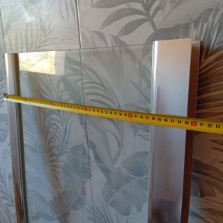 Mampara de bañera de cristal y metal