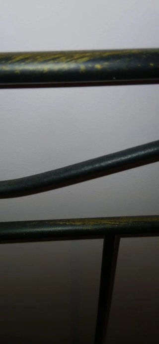 Cabecero forja negro y vetas doradas