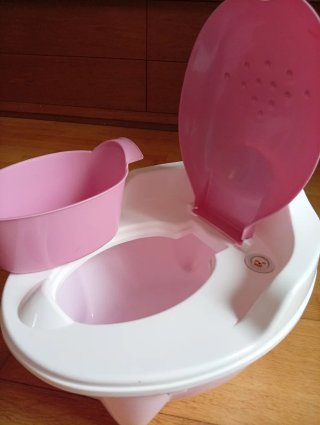 Orinal infantil rosa y blanco