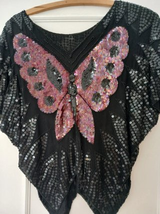 Blusa lentejuelas mariposa negra y rosa