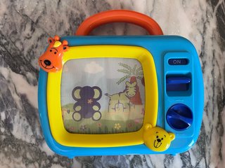 Juguete musical de cuerda TV infantil