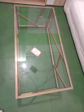 Mesa de centro cristal y metal dorado