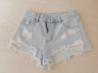 Shorts vaqueros desgastados denim azul claro