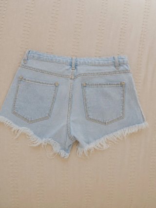 Shorts vaqueros desgastados denim azul claro
